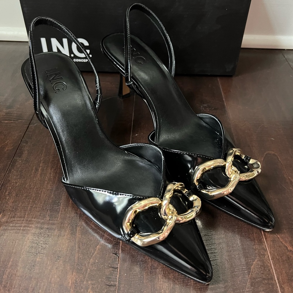 I.N.C. Geetap black shoes with gold hardware.